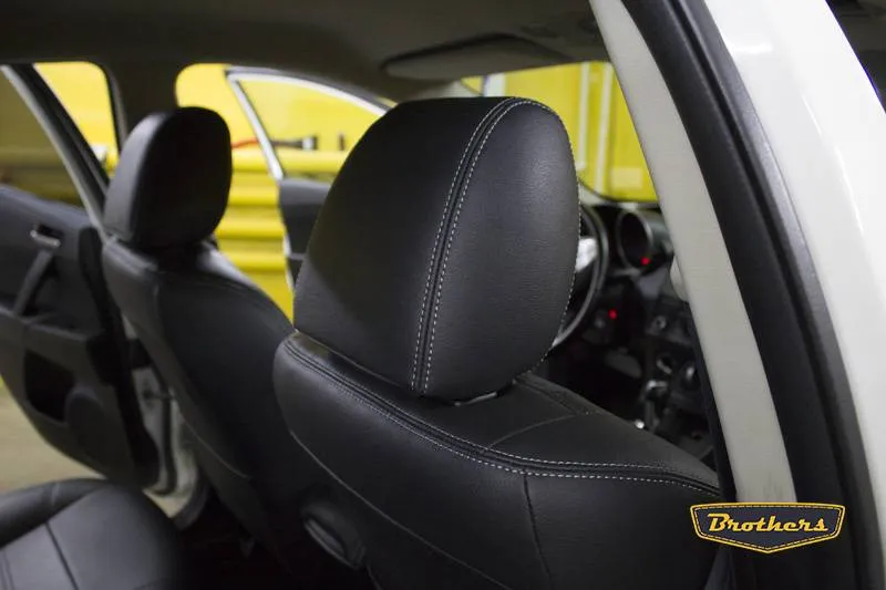 Установка чехлов серии Alcantara с продлением первого ряда сидений на Mazda 3 (BL)