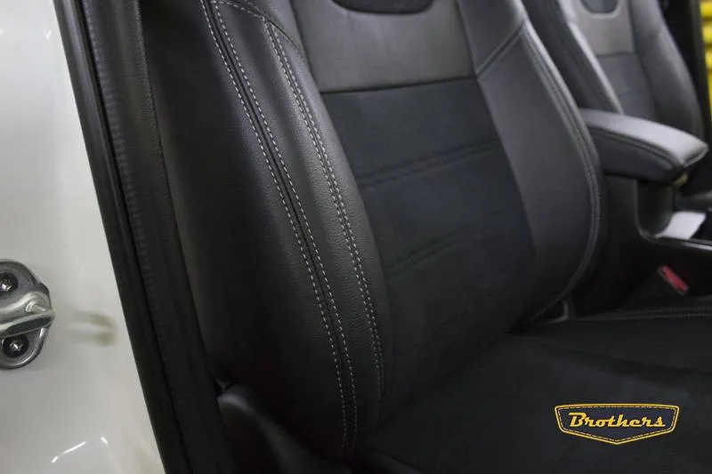 Установка чехлов серии Alcantara с продлением первого ряда сидений на Mazda 3 (BL)