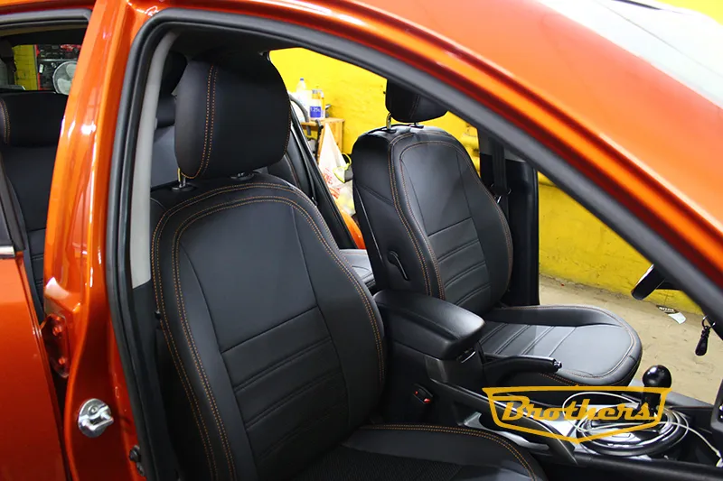 Чехлы на Kia Sportage 3, серии "Premium" - оранжевая строчка