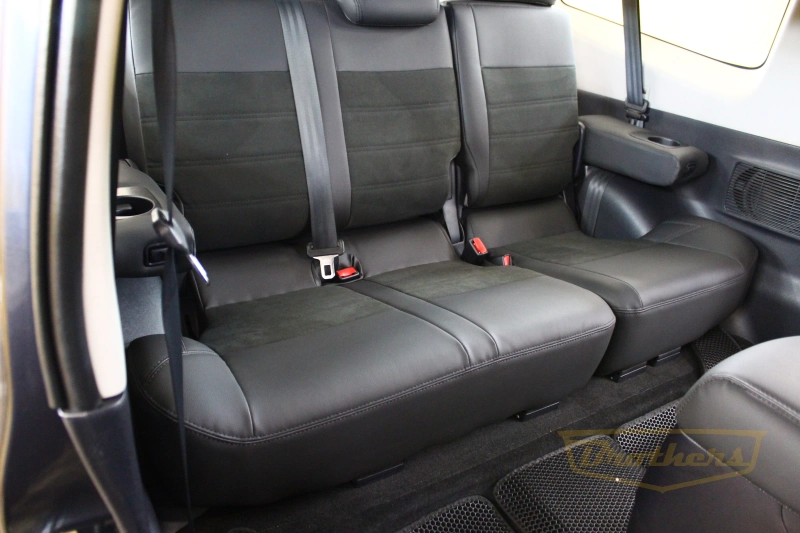 Чехлы на Mitsubishi Pajero 4 (3 двери) серии "Alcantara" - черная строчка, продление передних сидений алькантарой