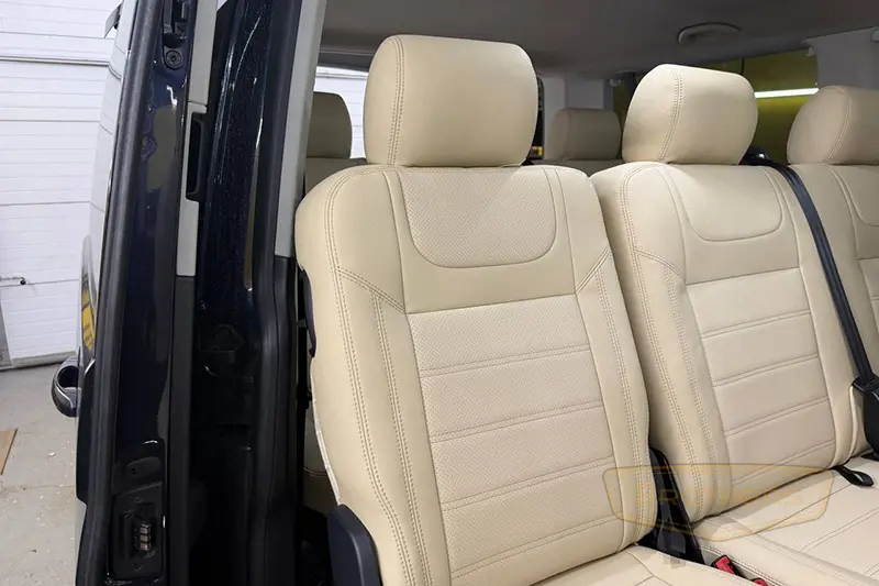 Чехлы для Volkswagen Caravelle T6 (8 мест) серии "Aurora" - бежевая строчка Чехлы для Volkswagen Caravelle T6 (8 мест) серии "Aurora" - бежевая строчка