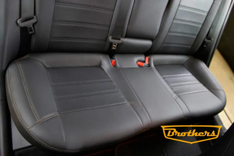 Чехлы на сиденья Hyundai Elantra 6 из экокожи с коричневой строчкой