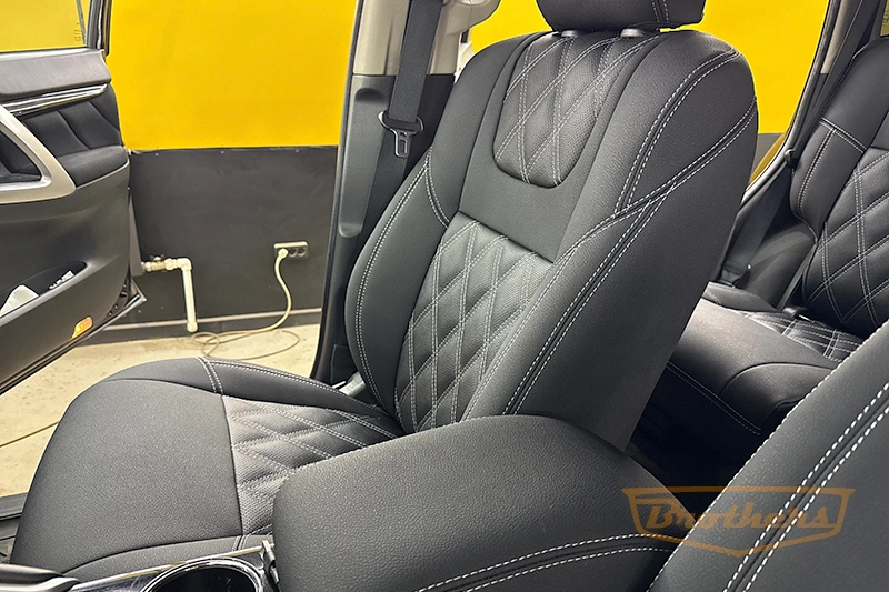 Чехлы на Mitsubishi Pajero Sport 3, серии "Aurora" с ромбами - серая строчка